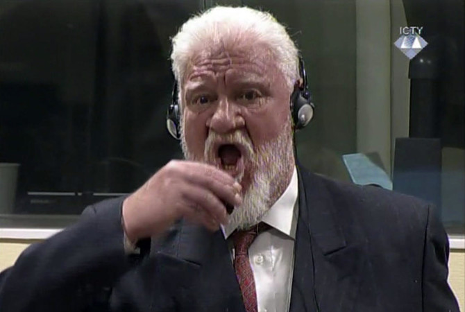 Dutch probe Bosnian war criminal’s live UN court suicide: see the video