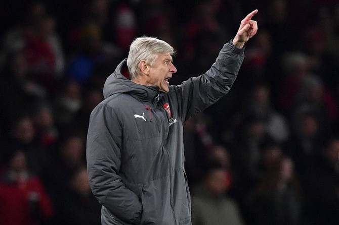 Wenger expects Manchester United to attack Arsenal