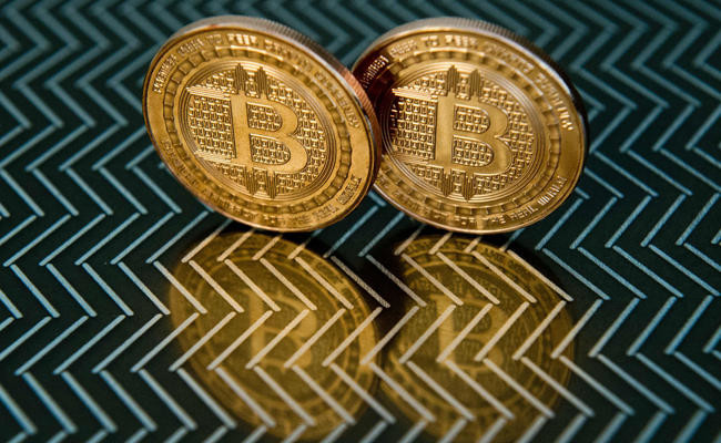 Ever-volatile bitcoin is embraced by Wall Street