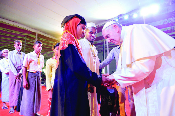 Pope holds emotional meeting with refugees, says ‘Rohingya’ for first time