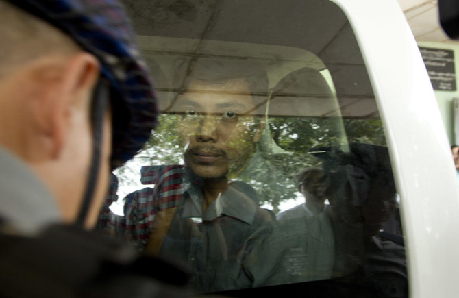 Reuters journalists charged with violating Myanmar’s Official Secrets Act