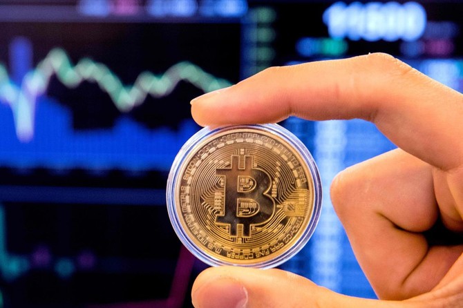 Bitcoin slides to below $10,000 for first time since December