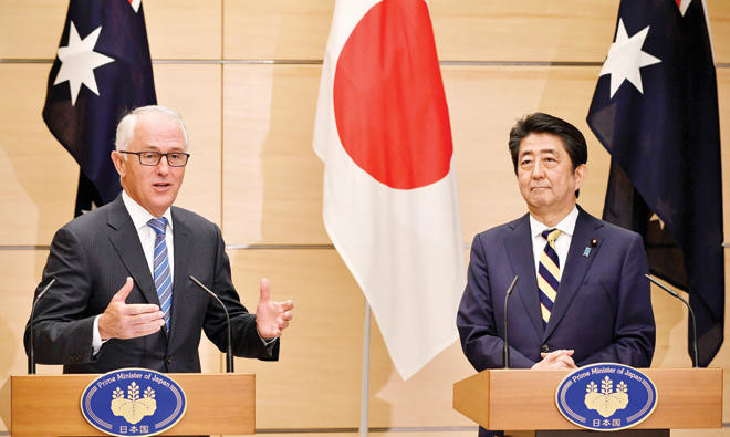 Japan, Australia push for defense pact amid regional tension