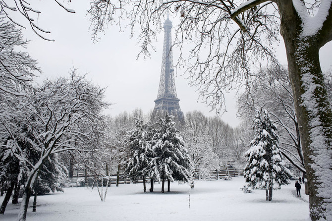 Eiffel Tower closed anew as snow, freezing rain pummel France