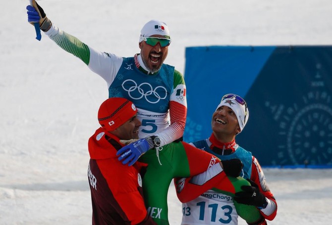 Arab history-maker Samir Azzimani carries fellow skier over line for 'moment of the Games'