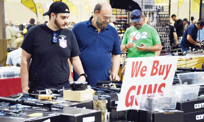 Pistols, rifles, ammunition on display at Miami gun show