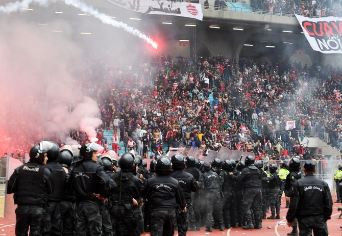 Referee suspended and claims of match fixing after fans riot in Tunisia derby match