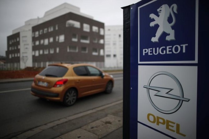 Peugeot hits new earnings record despite Opel loss