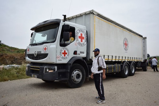 Aid reaches Syria’s Ghouta as strikes hit rebel enclave